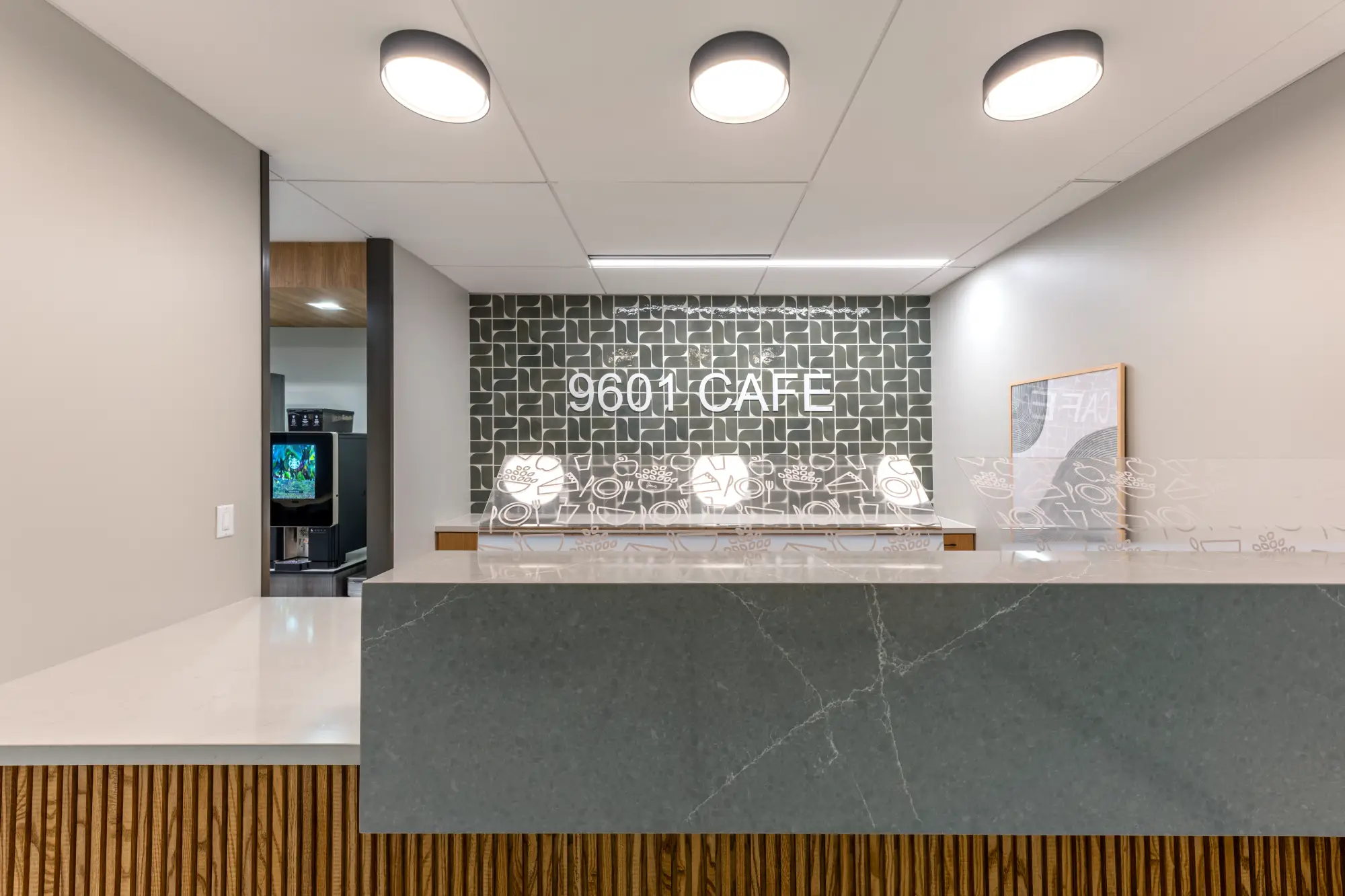 9601 Cafe reception counter viewed from behind with coffee station in background